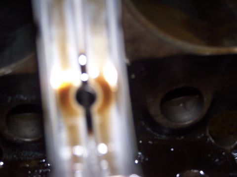 1974 Ford F-100 - Internal engine component with oil. The Supermotors.net logo is visible in the lower right corner.