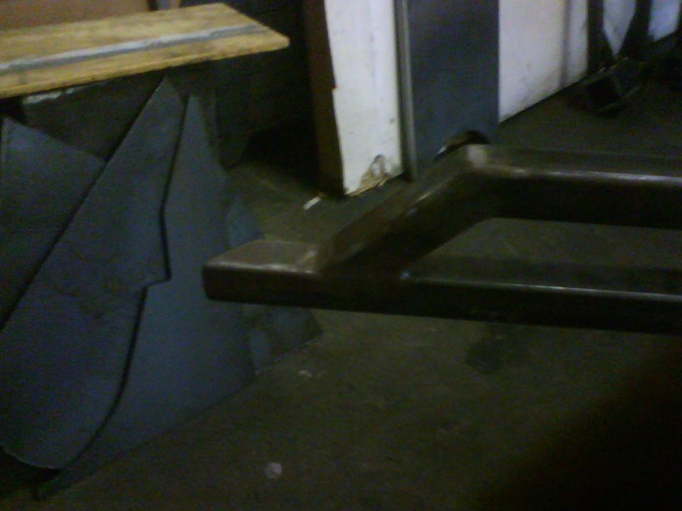 Dark metal rock slider with a rectangular opening