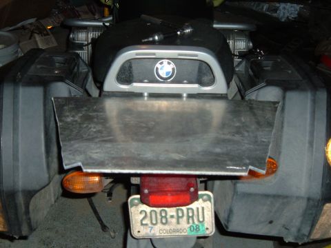 1998 BMW R1100GS ABS - A custom metal rear rack is mounted over the taillight and license plate of a motorcycle.