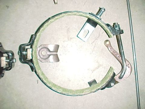 1915 Ford Model T - A close-up view of a brake band and lever assembly, showing the part number 'B22Z' stamped on the lever.