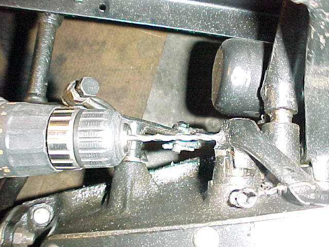 Drilling out the rivet from the brake pedal