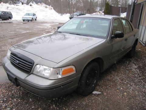2001 Ford Crown Victoria - This 2001 Ford Crown Victoria is seen from the front three-quarter view in a snowy outdoor setting.