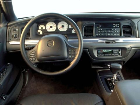 1996 Mercury Grand Marquis - The interior of a 1996 Mercury Grand Marquis, showing the dashboard, steering wheel, and center console.