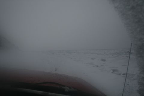 2003 Jeep TJ - Driving through a whiteout snowstorm with limited visibility.
