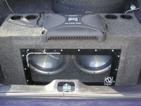 1999 Ford Crown Victoria - Aftermarket audio system installed in the trunk, dual subwoofers and a DUAL amplifier.
