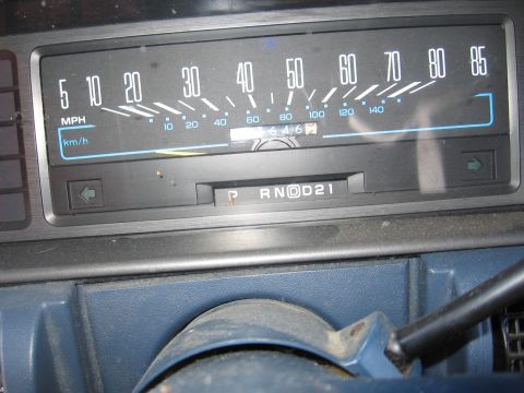 1999 Ford Taurus - Dashboard view of a car's speedometer and gear indicator, showing 64,6xx miles on the odometer.