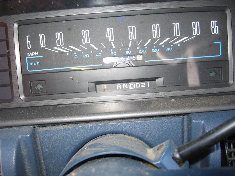 Car dashboard showing speedometer, odometer reading 646, and gear selector in 'P' (Park)
