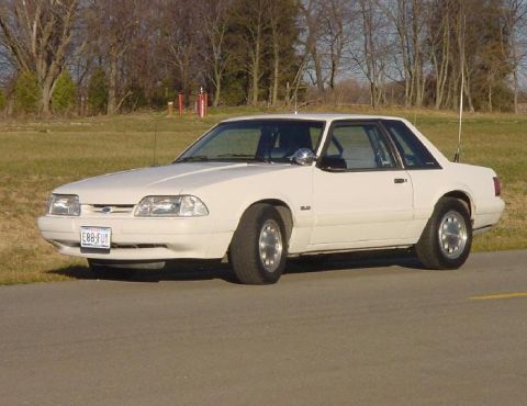1993 Ford Mustang - This 1993 Ford Mustang coupe is seen from the front three-quarter angle on a paved surface.