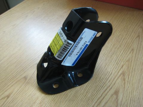 1991 Ford Bronco - A black metal bracket, likely a vehicle part, is shown with labels indicating its Ford part number and inspection details.