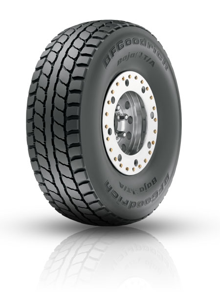 1984 Ford Bronco - BFGoodrich Baja T/A tire with a beadlock wheel is shown against a white background.
