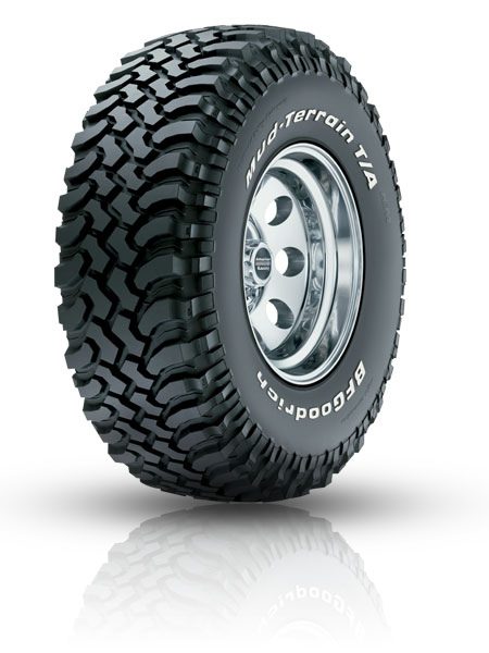 1984 Ford Bronco - A close-up view of a BFGoodrich Mud-Terrain T/A tire with aggressive tread.