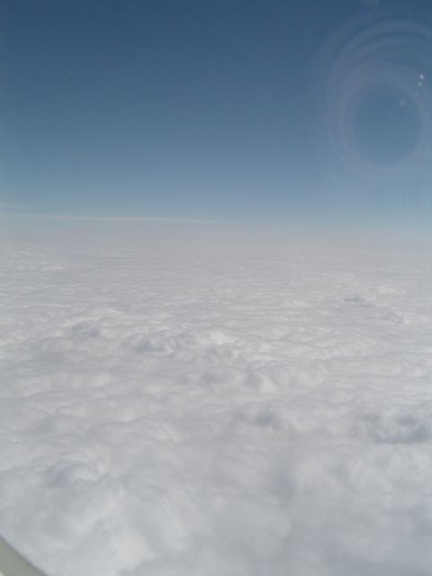 1989 Ford Bronco - Looking down on a sea of clouds from an airplane.
