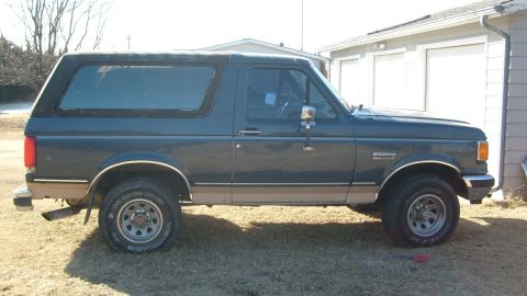 1995 Ford C-150 (Centurion Conversions) - This Ford Bronco appears to be from the early to mid-1990s, based on its body style.