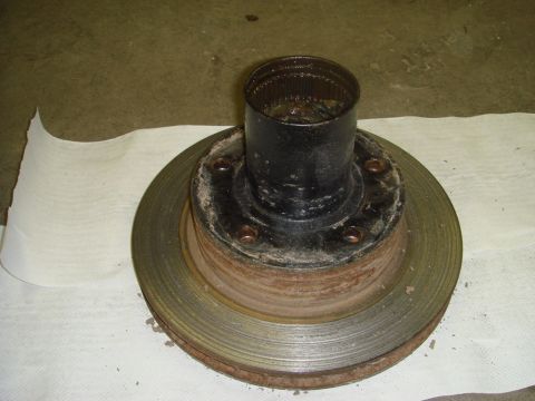 1996 Ford Bronco - A close-up view of a brake rotor and hub assembly, likely a replacement part.