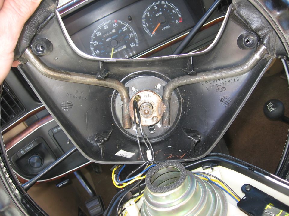 Interior shot of a 1987 Ford Bronco steering column with gauges visible