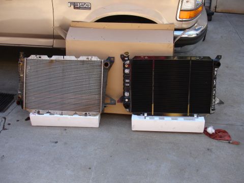 1992 Ford F-350 - Comparing an old radiator with a new one, with a 1992 Ford F350 truck in the background.