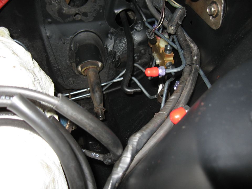 Close-up of brake lines and steering column assembly