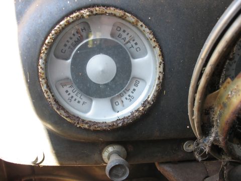 1952 Ford Panel Van - This dashboard gauge cluster shows readings for fuel, oil pressure, engine temperature, and battery charge.