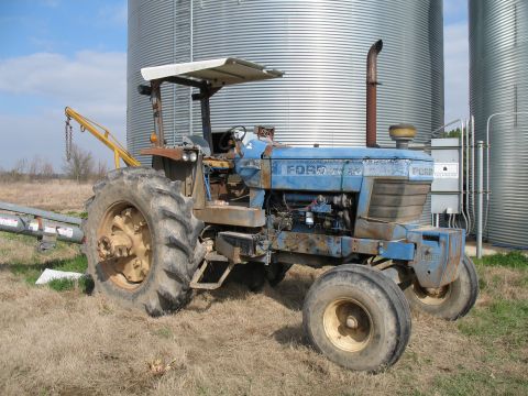 1993 Ford Bronco - TL, the Top Less TW-20 running the auger to load trucks.