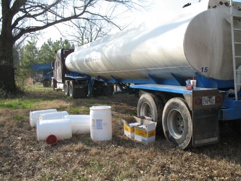 1993 Ford Bronco - Crop duster watering hole. The tanker and truck are ours.