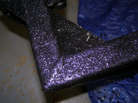 1993 Ford Bronco - The textured surface of a vehicle's rear bumper is shown in this close-up shot.
