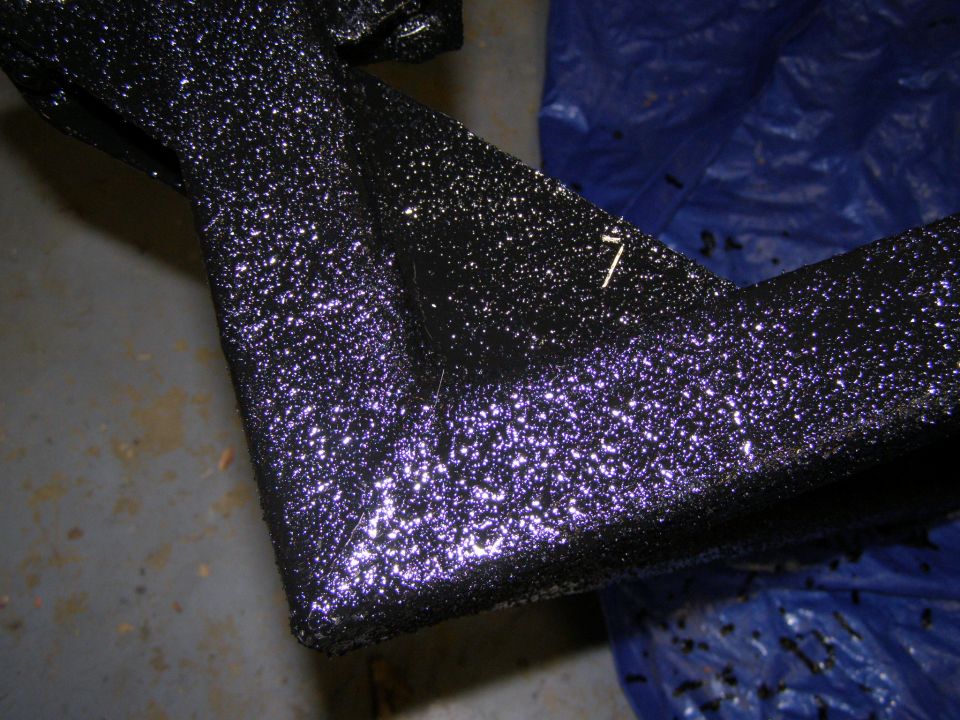Close-up of a textured rear bumper, possibly from a truck or SUV