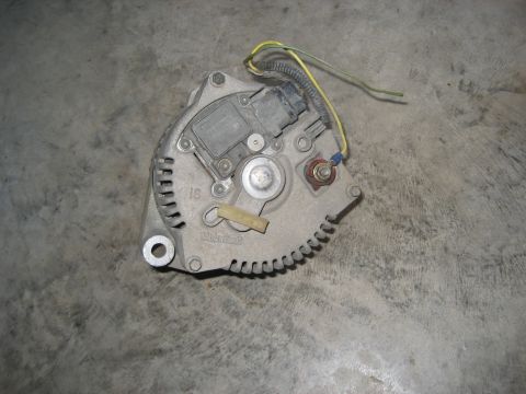 1981 Ford Bronco - This is a worn alternator, likely a replacement part for a Ford vehicle.