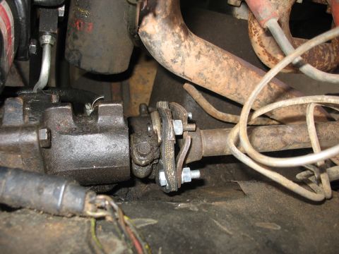 1978 Ford Bronco - A close-up view of a steering column universal joint, showing a part number stamped on the housing.