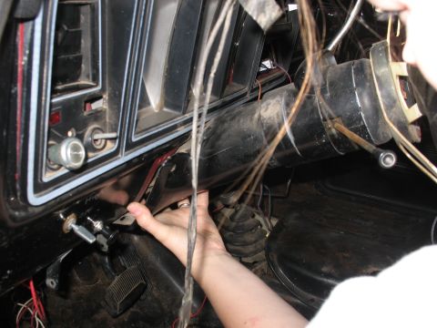 1978 Ford Bronco - A close-up shot of the steering column and dashboard area, showing various wires and controls.