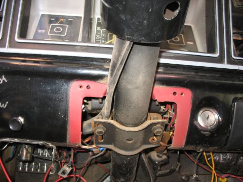 1978 Ford Bronco - Interior view of a 1978 Ford Bronco, focusing on the steering column and exposed wiring.