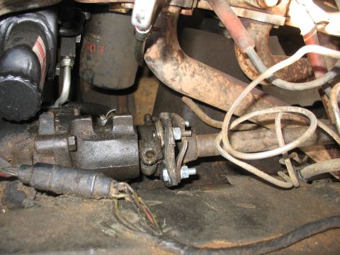 1978 Ford Bronco - The steering linkage and surrounding engine components are visible in this close-up shot.