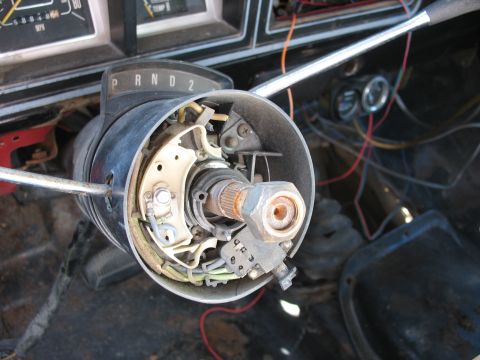 1978 Ford Bronco - Interior view of a disassembled steering column, showing mechanical components and wiring.