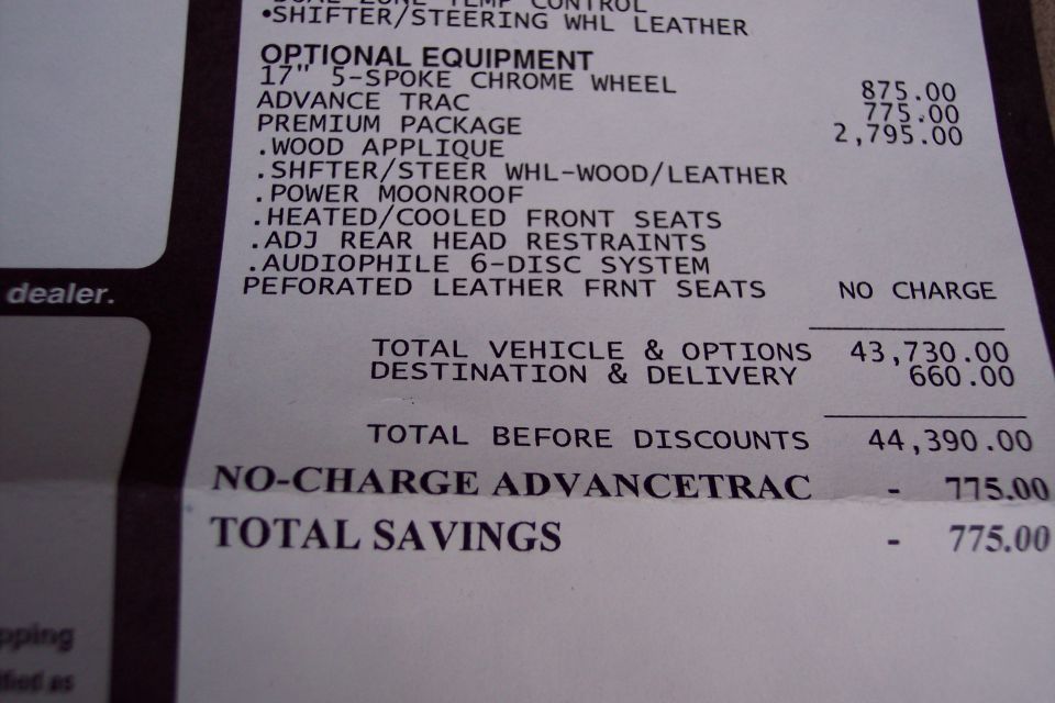Window sticker optional equipment close-up with premium package, Advance Trac and $44,390.00 total before discounts