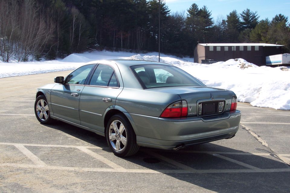 Green 2006 Lincoln LS sedan, rear 3/4 view