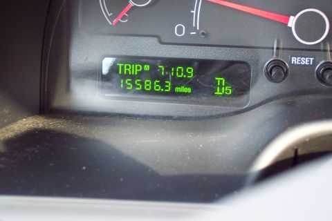 2001 Ford Crown Victoria - The odometer displays 155,863 miles and a trip reading of 7:10.9.