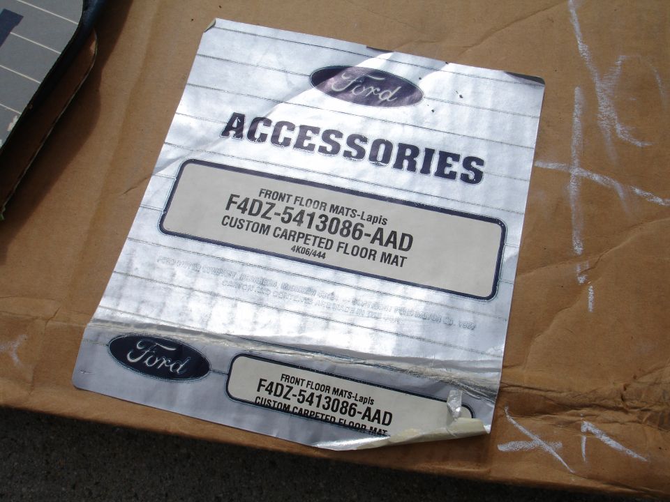 Ford Accessories packaging with part number F4DZ-5413086-AAD for custom carpeted floor mats
