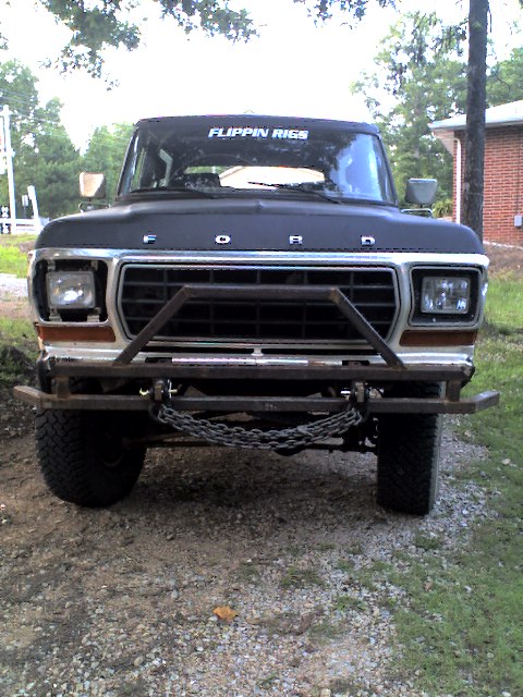 1979 Ford Bronco - This 1979 Ford Bronco features a custom front bumper with chains and a "FLIPPIN RIES" decal on the windshield.