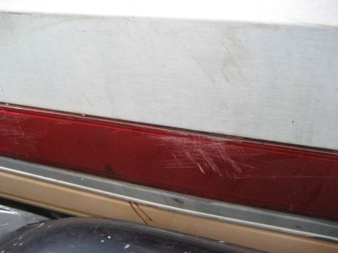 1981 Ford Bronco - Close-up of the rear quarter panel and taillight assembly on a 1981 Ford Bronco.