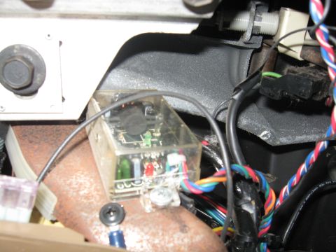 1990 Ford Bronco - An aftermarket electronic module with multiple colored wires is visible, attached to the vehicle's interior.