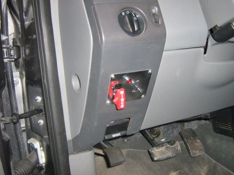 2004 Ford F-150 - Aftermarket switches and pedals are visible in the interior of this vehicle, with the word "BRAKE" clearly marked.