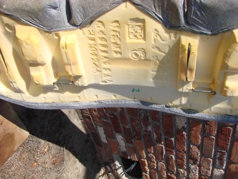 1997 Mercury Grand Marquis - This is what's on the underside of the back seat cushion. See the wire? It is what engages the hooks on the floor of the car.