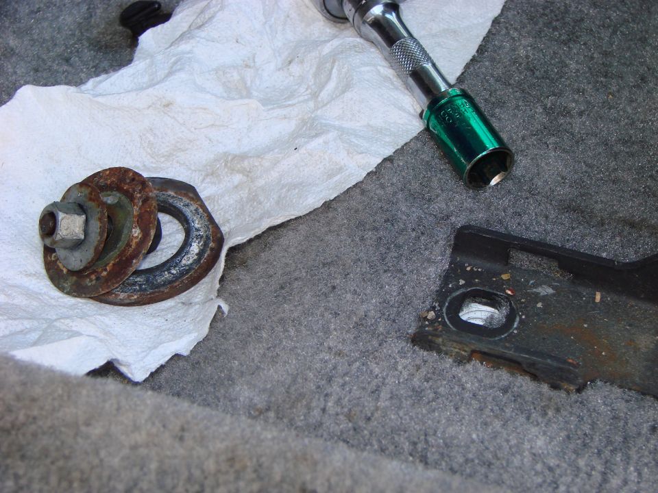 BTW - The outboard front fastener on the drivers seat is a bolt that will require a 13mm socket.  It is threated into the floor but there is also a nut with two big washers on the exterior underside of the car that is not captive.  You will have to hold it with a 13 mm wrench too.  It is the only one like it.