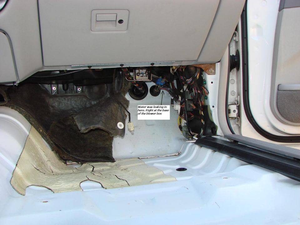 This is the area that was getting wet.  That sound insulation doesn't come out without removing the dashboard.  It goes all the way up to the base of the windshield.  BTW - Nice job at the factory placing that tarmac sound deadening.  It is rotated 90Â° Clockwise and about 6 inches inboard from where it should be!