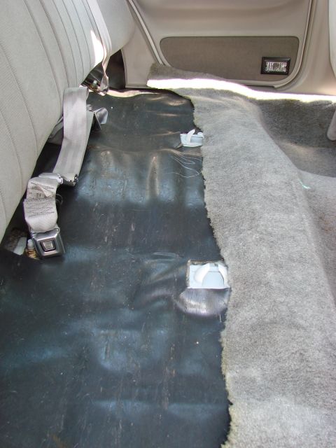 1997 Mercury Grand Marquis - This is what is under the rear seat cushion. See the "hooks"? They're white.