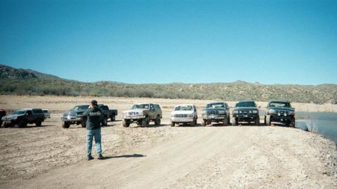 1993 Ford Bronco - That is Bud and his Ram. With some of the Nissan guys in the background...