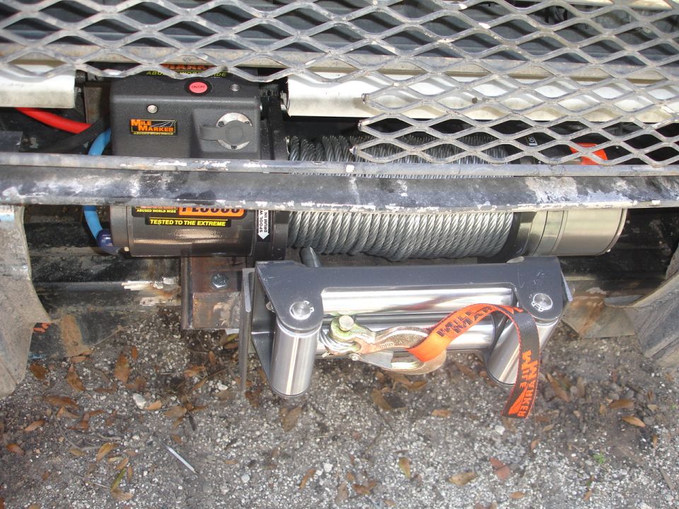 Winch mount with WARN winch and orange tow strap