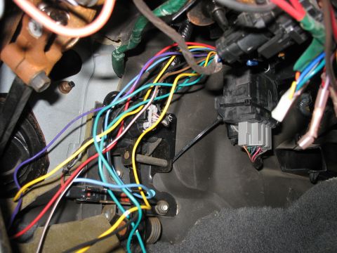 1995 Ford C-350 (Centurion Conversions) - Tangled vehicle wiring harness with multiple colored wires and connectors visible.