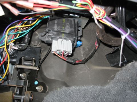 1995 Ford C-350 (Centurion Conversions) - Close-up of the interior wiring harness and control module, showing a Ford badge.