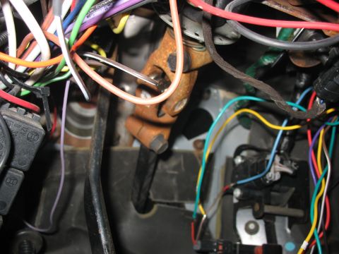 1995 Ford C-350 (Centurion Conversions) - A complex network of wires and the steering column linkage are visible in this interior shot.