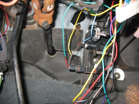1995 Ford C-350 (Centurion Conversions) - Vehicle wiring harness with multiple colored wires and connectors visible under the dashboard.